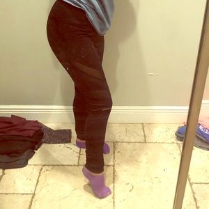 Black leggings with mesh cutouts